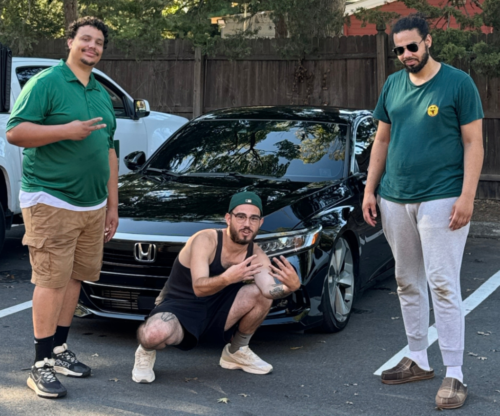 HH Premium Services team standing with freshly detailed black Honda in New Jersey